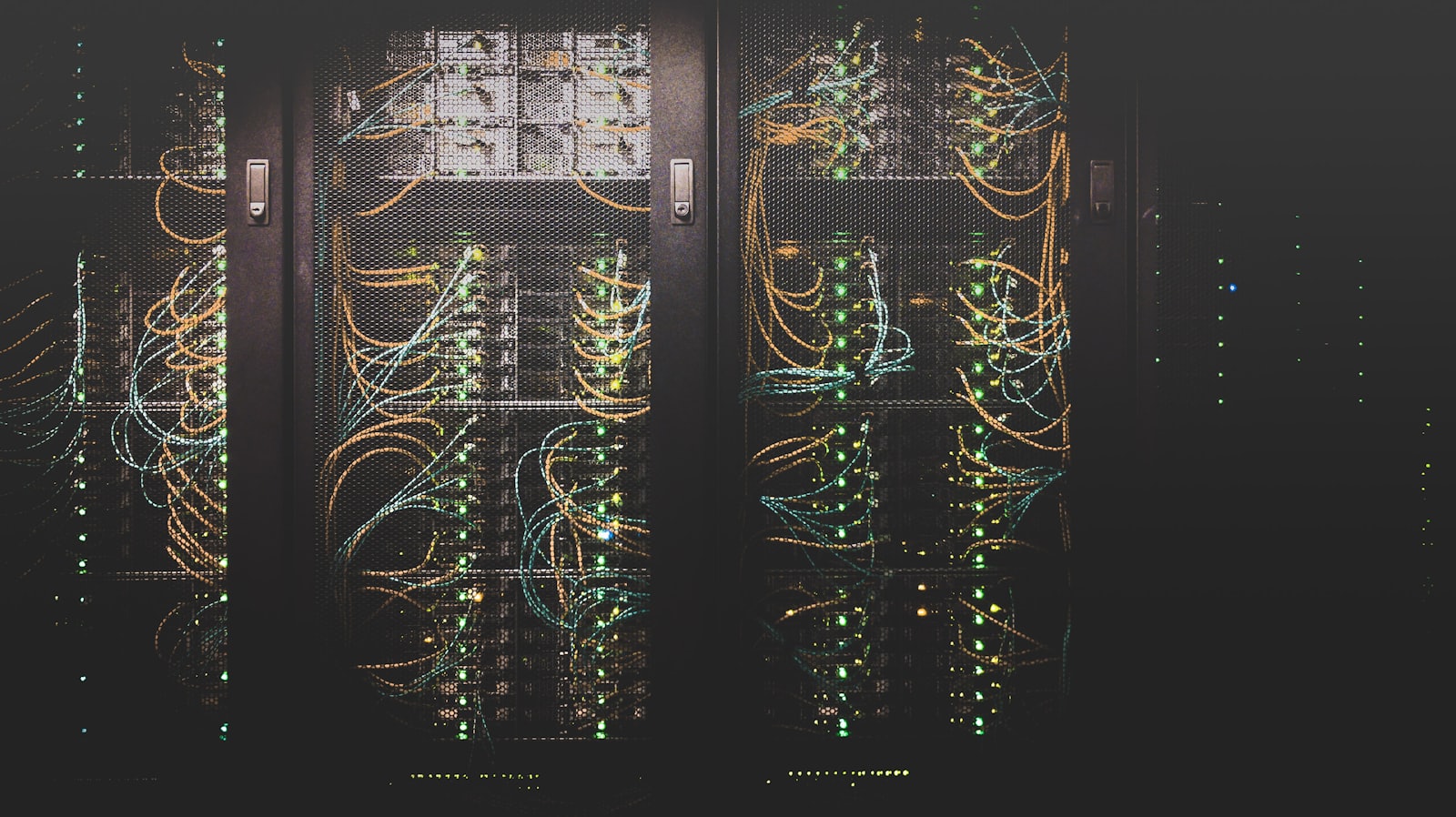 Enterprise server room with racks of networking and server hardware.